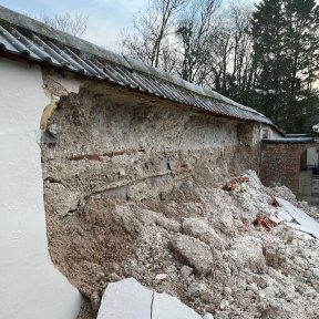 Collapsed wall